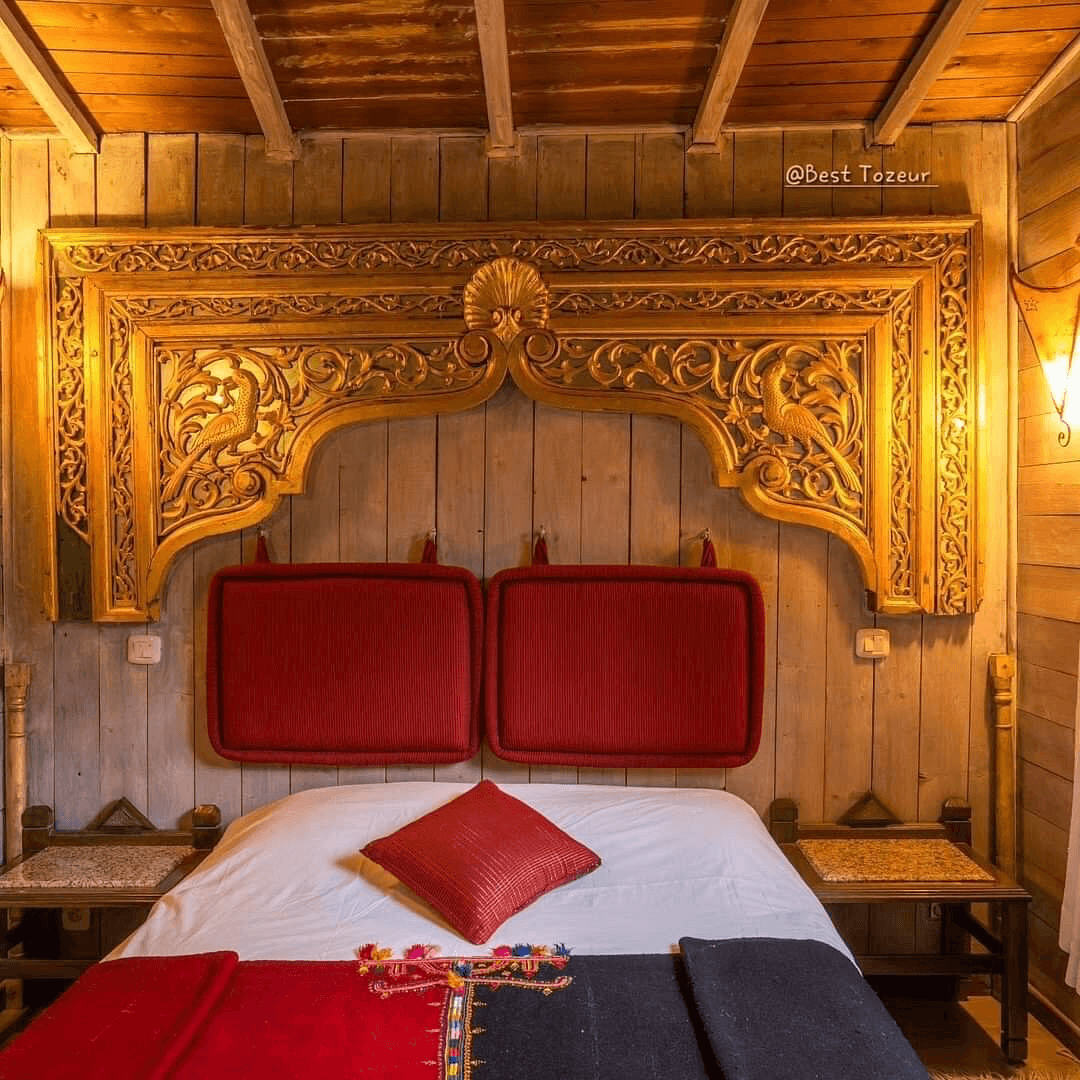 Carved wooden bedroom at Diar Abou Habibi